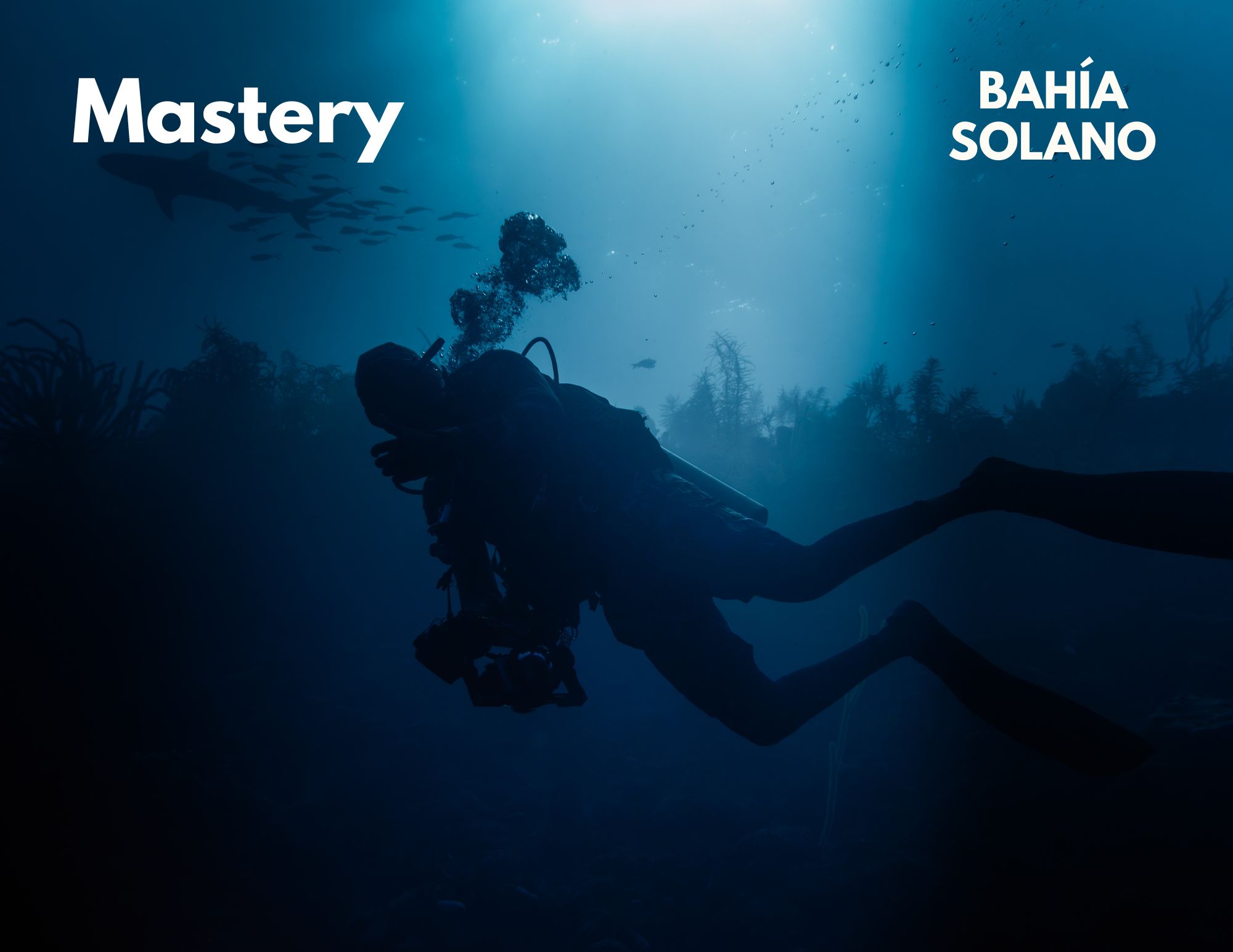 SSI Instructor candidates demonstrating perfect buoyancy and trim during a blue water descent in Bahía Solano, with the text "Mastery" overlaid.